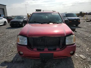 2004 GMC Envoy SLT with VIN 1GKDT13S542237139, listed as a Copart auction lot 66352174 with 174,344 mi miles and Salvage Title. Bid and sale history available at carsss.com. Image 5.