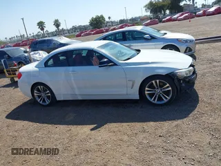 2015 BMW 4 Series 428i z VIN WBA3V7C58FP771642, wystawiony jako IAAI lot #42524828 z przebiegiem 64 440 mil mil oraz . Historia ofert i sprzedaży dostępna na DreamBid. Obrazek 14.