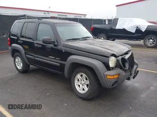 2003 Jeep Liberty Sport with VIN 1J4GK48KX3W656837, listed as a IAAI auction lot 40785615 with 164,450 mi miles and . Bid and sale history available at DreamBid. Image 1.