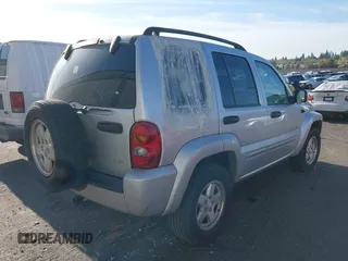 2003 Jeep Liberty Limited z VIN 1J8GL58K73W694818, wystawiony jako IAAI lot #42032227 z przebiegiem 217 446 mil mil oraz . Historia ofert i sprzedaży dostępna na DreamBid. Obrazek 4.