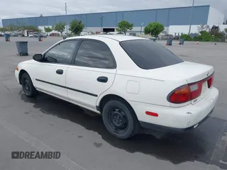 1997 Mazda Protege DX with VIN JM1BC1417V0156858, listed as a IAAI auction lot 42118339 with 187,673 mi miles and . Bid and sale history available at DreamBid. Image 3.