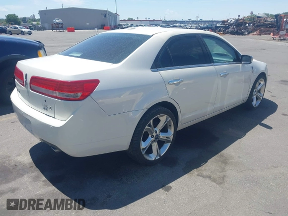 2011 Lincoln MKZ with VIN 3LNHL2JC2BR772688, listed as a IAAI auction lot 42525389 with 127,530 mi miles and . Bid and sale history available at DreamBid. Image 4.