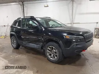 2022 Jeep Cherokee Trailhawk with VIN 1C4PJMBX8ND517236, listed as a IAAI auction lot 41530369 with 34,164 mi miles. Bid and sale history available at carsss.com. Image 1.