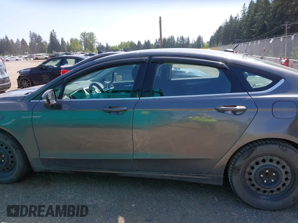 2016 Ford Fusion SE with VIN 3FA6P0HD4GR247759, listed as a IAAI auction lot 42157720 with 184,356 mi miles and . Bid and sale history available at DreamBid. Image 14.
