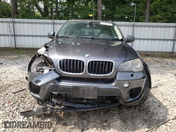 2012 BMW X5 35i z VIN 5UXZV4C55CL753810, wystawiony jako Copart lot #62405565 z przebiegiem 178 504 mil mil oraz Szkoda całkowita • Salvage title. Historia ofert i sprzedaży dostępna na DreamBid. Obrazek 5.