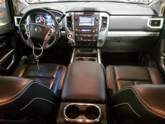2016 Nissan Titan XD Platinum Reserve with VIN 1N6BA1F44GN503112, listed as a Copart auction lot 81138394 with 143,321 mi miles and Salvage Title. Bid and sale history available at carsss.com. Image 8.