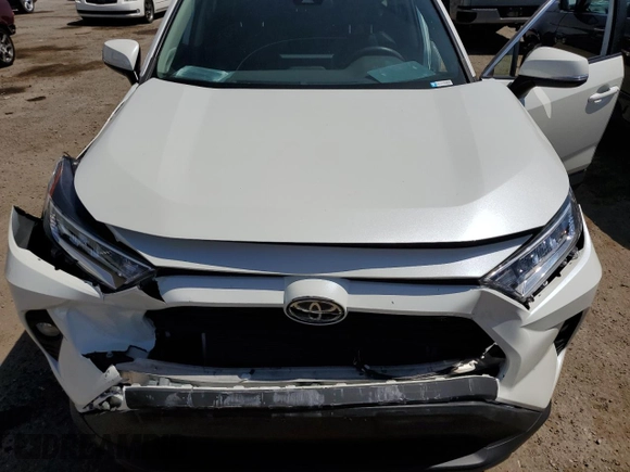 2021 Toyota RAV4 XLE Premium with VIN 2T3C1RFV0MW153089, listed as a Copart auction lot 60759615 with 28,153 mi miles and Salvage title. Bid and sale history available at DreamBid. Image 11.