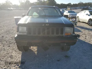 1995 Jeep Grand Cherokee Limited with VIN 1J4GZ78Y7SC730118, listed as a Copart auction lot 76031964 with 184,074 mi miles and Salvage Title. Bid and sale history available at carsss.com. Image 5.