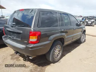 2004 Jeep Grand Cherokee Limited with VIN 1J8GX58NX4C422930, listed as a IAAI auction lot 41935711 with 223,844 mi miles and . Bid and sale history available at DreamBid. Image 4.