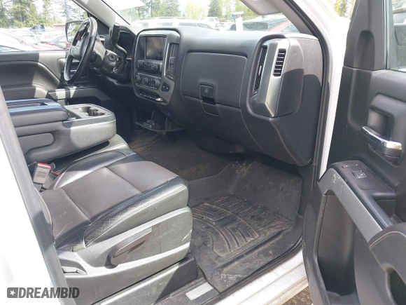 2017 Chevrolet Silverado 1500 LT with VIN 1GCVKREC7HZ131196, listed as a IAAI auction lot 42072336 with 158,140 mi miles. Bid and sale history available at carsss.com. Image 5.