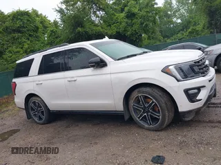 2019 Ford Expedition Limited z VIN 1FMJU2AT1KEA41705, wystawiony jako IAAI lot #42285780 z przebiegiem Nie podano mil oraz . Historia ofert i sprzedaży dostępna na DreamBid. Obrazek 13.