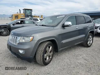2011 Jeep Grand Cherokee Overland Summit with VIN 1J4RR6GT7BC738177, listed as a Copart auction lot 59137975 with 157,818 mi miles and Salvage title. Bid and sale history available at DreamBid. Image 1.
