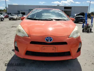 2012 Toyota Prius c One with VIN JTDKDTB35C1030051, listed as a Copart auction lot 52895065 with 94,529 mi miles and Salvage Title. Bid and sale history available at carsss.com. Image 5.
