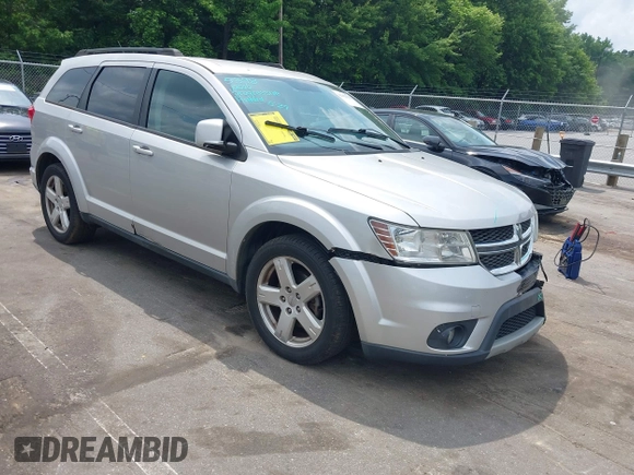 2012 Dodge Journey SXT z VIN 3C4PDCBGXCT324756, wystawiony jako IAAI lot #42422533 z przebiegiem 241 934 mil mil oraz . Historia ofert i sprzedaży dostępna na DreamBid. Obrazek 1.
