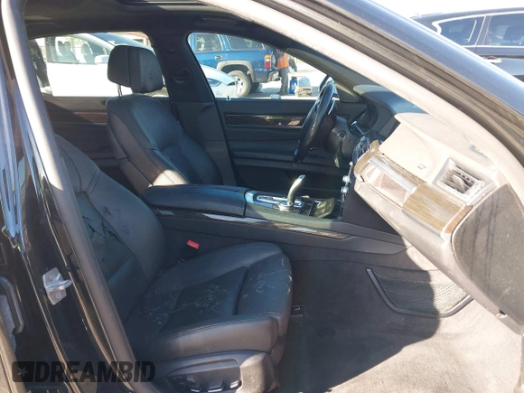2014 BMW 7 Series 740Li with VIN WBAYE4C56ED137847, listed as a IAAI auction lot 39452255 with 184,471 mi miles. Bid and sale history available at carsss.com. Image 5.