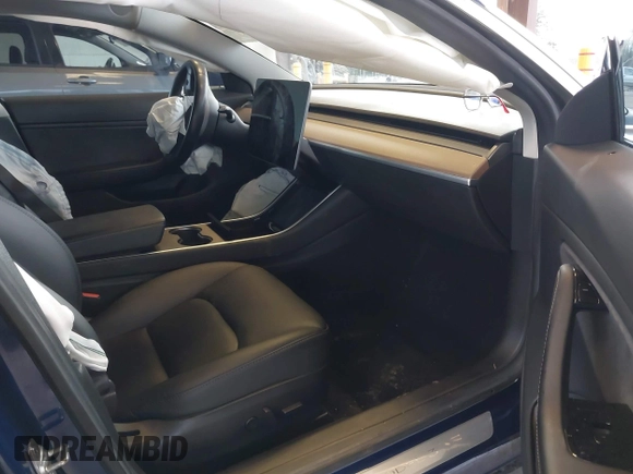 2018 Tesla Model 3 Long Range Battery z VIN 5YJ3E1EA7JF035949, wystawiony jako IAAI lot #41627027 z przebiegiem Nie podano mil oraz . Historia ofert i sprzedaży dostępna na DreamBid. Obrazek 5.