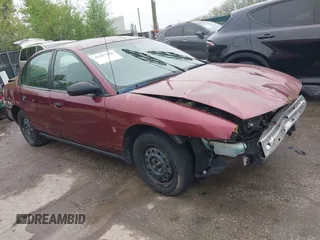 2001 Saturn SL z VIN 1G8ZH528X1Z355295, wystawiony jako IAAI lot #42057484 z przebiegiem 202 555 mil mil oraz . Historia ofert i sprzedaży dostępna na DreamBid. Obrazek 1.