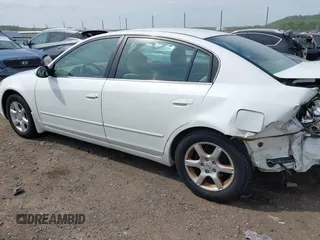 2006 Nissan Altima S with VIN 1N4AL11D76N429043, listed as a IAAI auction lot 42061407 with 163,528 mi miles and . Bid and sale history available at DreamBid. Image 14.