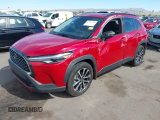 2024 Toyota Corolla Cross XLE with VIN 7MUDAAAG2RV095547, listed as a IAAI auction lot 42087409 with 15,402 mi miles and . Bid and sale history available at DreamBid. Image 2.