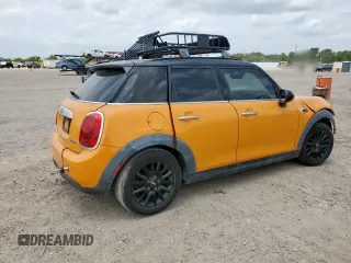2015 MINI Hardtop 4 Door z VIN WMWXS5C59FT831465, wystawiony jako Copart lot #57534805 z przebiegiem Nie podano mil oraz Czysty tytuł • Clean title. Historia ofert i sprzedaży dostępna na DreamBid. Obrazek 3.