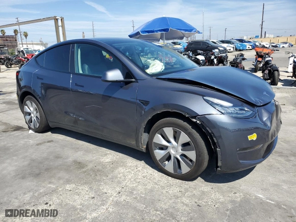 2022 Tesla Model Y Long Range with VIN 7SAYGAEE1NF486077, listed as a Copart auction lot 50526795 with 24,858 mi miles and Salvage Title. Bid and sale history available at carsss.com. Image 4.