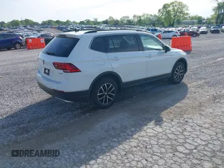 2021 Volkswagen Tiguan SE with VIN 3VV2B7AX6MM139903, listed as a IAAI auction lot 42060657 with 42,747 mi miles and . Bid and sale history available at DreamBid. Image 4.