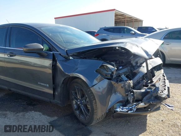 2018 Ford Fusion SE z VIN 3FA6P0LU8JR116073, wystawiony jako IAAI lot #41773037 z przebiegiem 100 864 mil mil oraz . Historia ofert i sprzedaży dostępna na DreamBid. Obrazek 6.
