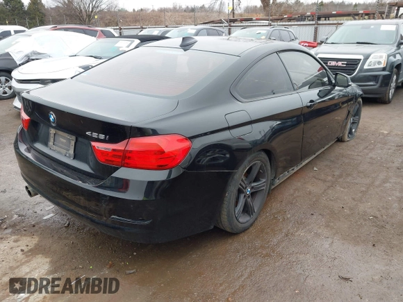 2014 BMW 4 Series 428i with VIN WBA3N7C50EF718339, listed as a IAAI auction lot 41403096 with 143,478 mi miles and . Bid and sale history available at carsss.com. Image 4.