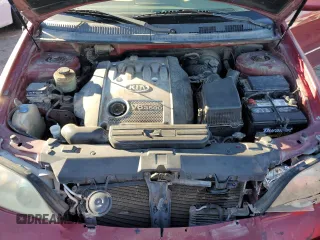 2005 Kia Sedona LX with VIN KNDUP132156669009, listed as a Copart auction lot 76936094 with 124,989 mi miles and Salvage Title. Bid and sale history available at carsss.com. Image 12.