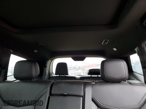 2023 Cadillac XT6 FWD Premium Luxury z VIN 1GYKPCRS5PZ119186, wystawiony jako Copart lot #50577175 z przebiegiem 32 189 mil mil oraz Szkoda całkowita • Salvage title. Historia ofert i sprzedaży dostępna na DreamBid. Obrazek 10.