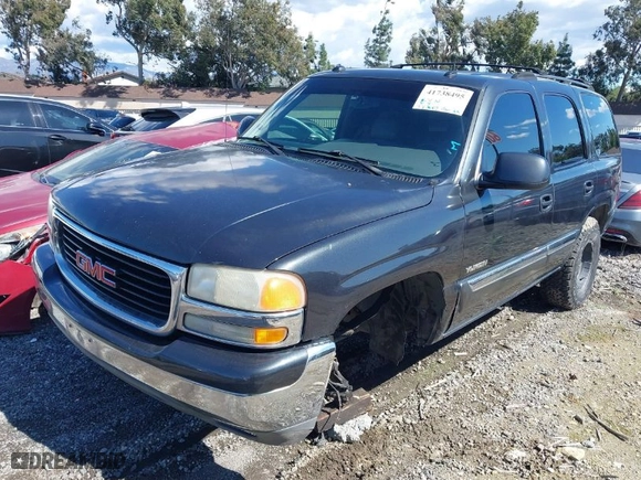 2003 GMC Yukon SLT with VIN 1GKEC13T53R298171, listed as a IAAI auction lot 41738495 with 237,669 mi miles. Bid and sale history available at carsss.com. Image 2.