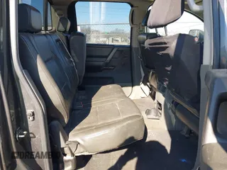 2005 Nissan Titan SE with VIN 1N6BA07B15N569959, listed as a IAAI auction lot 41389671 with 188,335 mi miles and . Bid and sale history available at DreamBid. Image 8.