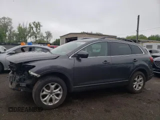 2013 Mazda CX-9 Sport z VIN JM3TB2BAXD0407507, wystawiony jako Copart lot #56090015 z przebiegiem 180 222 mil mil oraz Szkoda całkowita • Salvage title. Historia ofert i sprzedaży dostępna na DreamBid. Obrazek 1.
