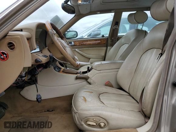 1997 Jaguar XJ Vanden Plas with VIN SAJKX6245VC800386, listed as a Copart auction lot 53651675 with 158,185 mi miles and Salvage Title. Bid and sale history available at DreamBid. Image 7.