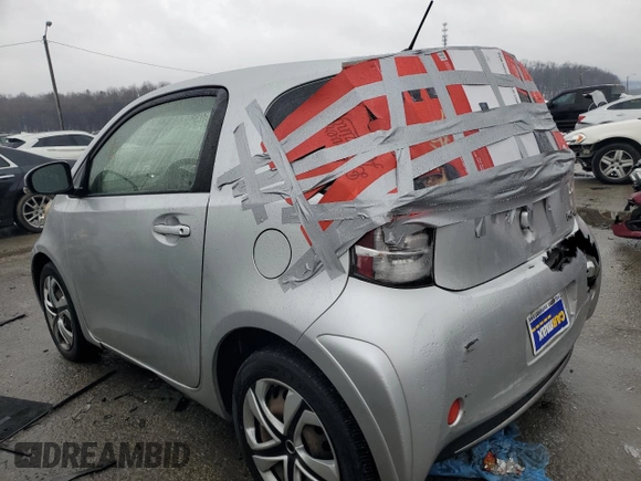 2013 Scion iQ with VIN JTNJJXB08DJ025554, listed as a Copart auction lot 88923885 with 110,378 mi miles and Salvage title. Bid and sale history available at DreamBid. Image 2.