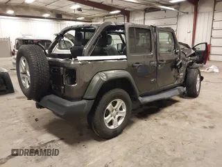 2019 Jeep Wrangler Unlimited Sport S z VIN 1C4HJXDG6KW598997, wystawiony jako IAAI lot #42473098 z przebiegiem 59 232 mil mil oraz . Historia ofert i sprzedaży dostępna na DreamBid. Obrazek 4.