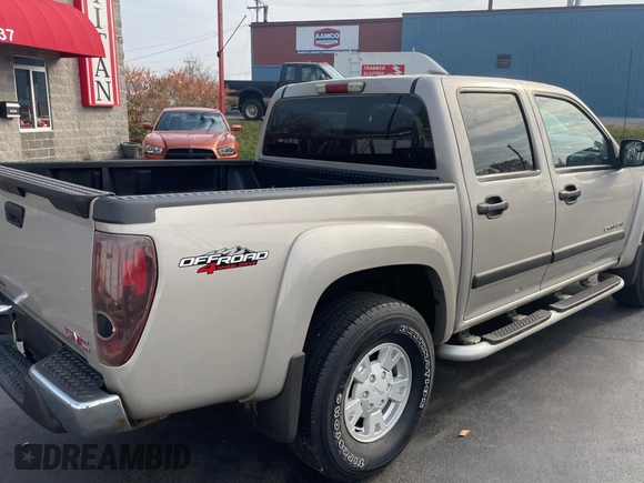 2004 GMC Canyon 1SB SLE Z85 with VIN 1GTDT136648111531, listed as a Copart auction lot 80749344 with 130,484 mi miles and Clean Title. Bid and sale history available at carsss.com. Image 4.