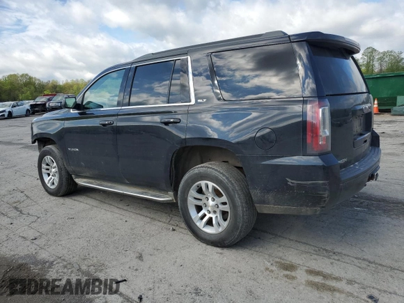 2015 GMC Yukon SLT with VIN 1GKS2BKC6FR145140, listed as a Copart auction lot 55451365 with 216,522 mi miles and Salvage Title. Bid and sale history available at DreamBid. Image 2.