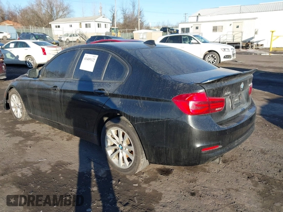 2018 BMW 3 Series 320i xDrive with VIN WBA8E5G57JNU47770, listed as a IAAI auction lot 41409122 with 62,198 mi miles. Bid and sale history available at carsss.com. Image 3.