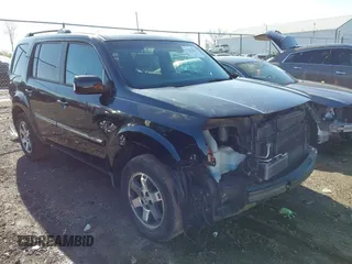 2011 Honda Pilot Touring z VIN 5FNYF3H98BB029658, wystawiony jako IAAI lot #41982910 z przebiegiem 194 640 mil mil oraz . Historia ofert i sprzedaży dostępna na DreamBid. Obrazek 1.