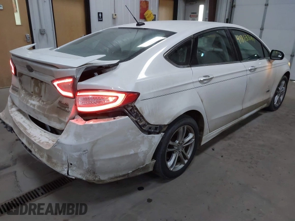 2016 Ford Fusion Titanium with VIN 3FA6P0SU8GR259163, listed as a IAAI auction lot 41812294 with 151,002 mi miles and . Bid and sale history available at DreamBid. Image 4.