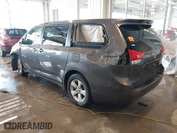 2012 Toyota Sienna with VIN 5TDKA3DC0CS012095, listed as a IAAI auction lot 41317071 with Not Provided miles and . Bid and sale history available at DreamBid. Image 3.