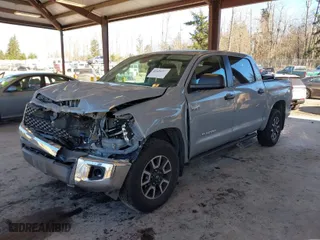 2021 Toyota Tundra 4WD SR5 with VIN 5TFDY5F14MX026220, listed as a IAAI auction lot 41425555 with 85,622 mi miles. Bid and sale history available at carsss.com. Image 2.