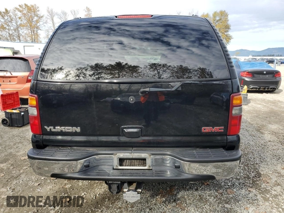 2002 GMC Yukon SLT z VIN 1GKEK13Z52J184367, wystawiony jako Copart lot #75938904 z przebiegiem 119 717 mil mil oraz Szkoda całkowita • Salvage title. Historia ofert i sprzedaży dostępna na DreamBid. Obrazek 6.