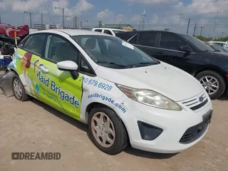 2011 Ford Fiesta S with VIN 3FADP4AJ1BM142682, listed as a IAAI auction lot 42162397 with 214,403 mi miles and . Bid and sale history available at DreamBid. Image 1.