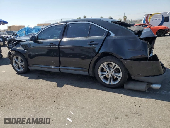 2015 Ford Taurus SEL with VIN 1FAHP2E86FG130511, listed as a Copart auction lot 60545805 with 99,215 mi miles and Salvage title. Bid and sale history available at DreamBid. Image 2.