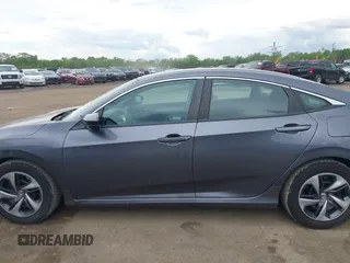 2020 Honda Civic LX z VIN 2HGFC2F62LH547412, wystawiony jako IAAI lot #42254847 z przebiegiem 62 519 mil mil oraz . Historia ofert i sprzedaży dostępna na DreamBid. Obrazek 14.