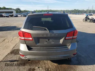 2013 Dodge Journey SXT with VIN 3C4PDCBG0DT522408, listed as a Copart auction lot 62699195 with 130,665 mi miles and Salvage title. Bid and sale history available at DreamBid. Image 6.
