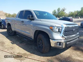 2021 Toyota Tundra SR with VIN 5TFRY5F15MX300045, listed as a IAAI auction lot 42666519 with 30,609 mi miles and . Bid and sale history available at DreamBid. Image 1.