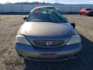 2004 Mercury Sable GS z VIN 1MEFM50U94G609775, wystawiony jako Copart lot #41688355 z przebiegiem Nie podano mil oraz Szkody całkowita. Historia ofert i sprzedaży dostępna na DreamBid. Obrazek 5.